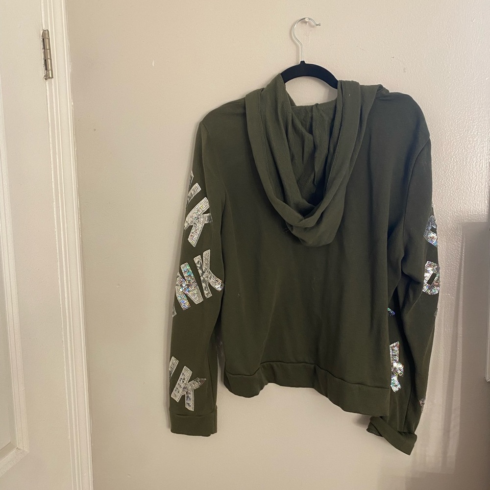Pink: olive green sweater